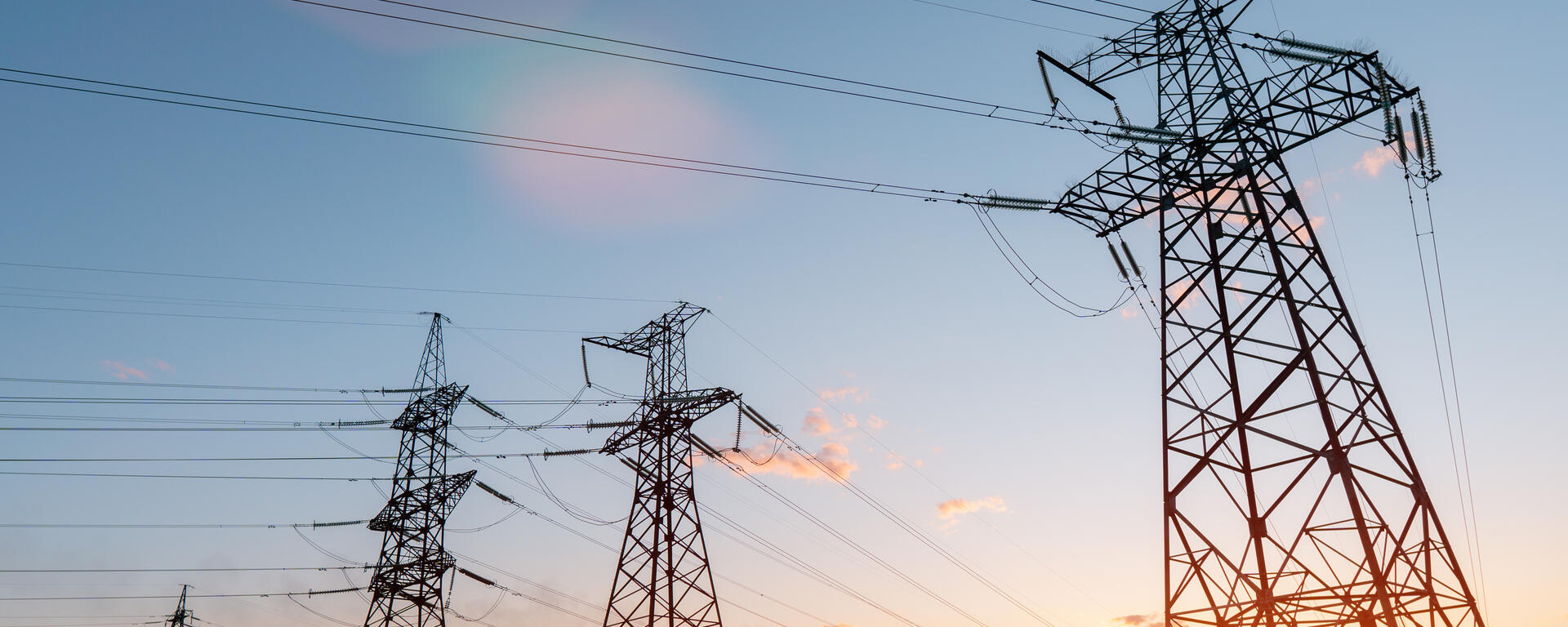 Power lines at sunset, banner