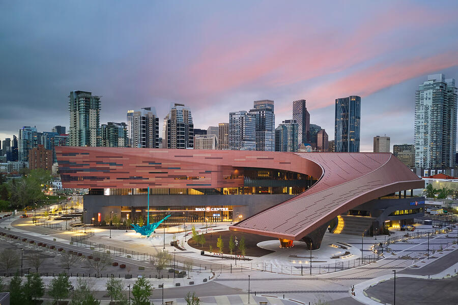 Photo of the BMO event centre, Calgary downtown skyline in the background